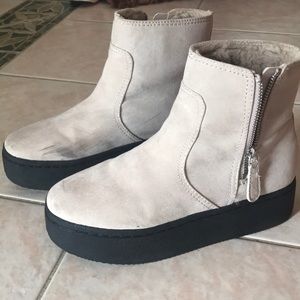 Platform suede booties with fur insolation.